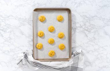 Lemon Cookies with White Chocolate. Flat lay. Cooling freshly baked lemon cookies with white chocolate on a kitchen counter.