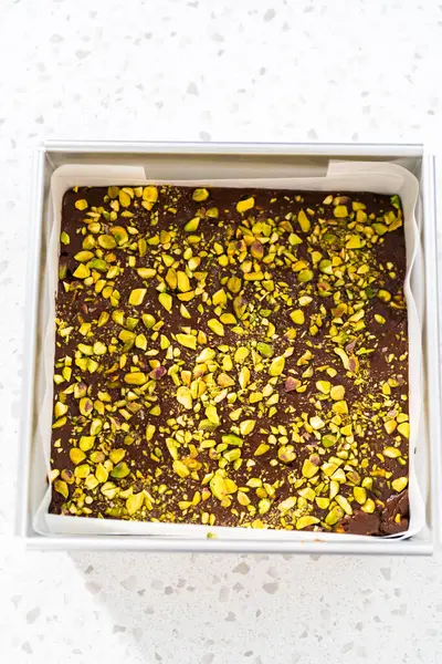 Filling Square Cheesecake Pan Lined Parchment Paper Fudge Mixture Prepare — Fotografia de Stock