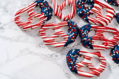 American flag. Red, white, and blue chocolate-covered pretzel twists.