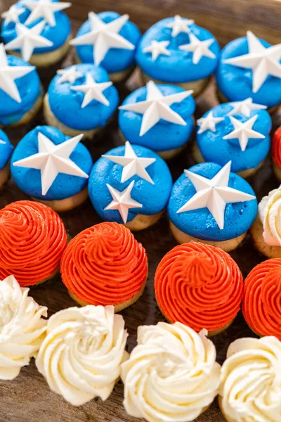 Arranging Mini Vanilla Cupcakes Shape American Flag Stock Picture