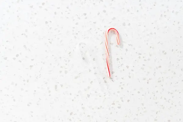 Flat Lay Unwrapping Peppermint Candy Cane Kitchen Counter — Stock Photo, Image