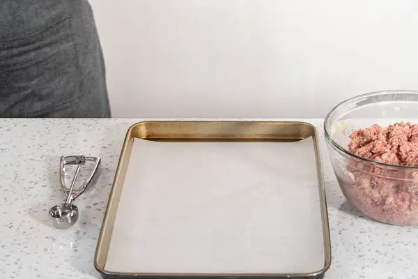 Scooping Ground Meat Dough Scoop Baking Sheet Lined Parchment Paper — Stock Photo, Image