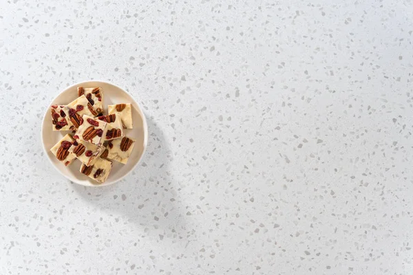 Flat Lay Homemade White Chocolate Cranberry Pecan Fudge Pieces White — Stock Photo, Image