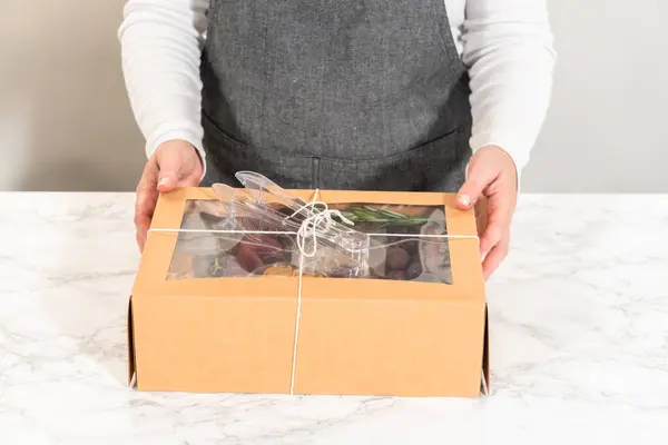 Charcuterie Box Featuring Sliced Meat Cheese Crackers Grapes All Neatly — Stock Photo, Image