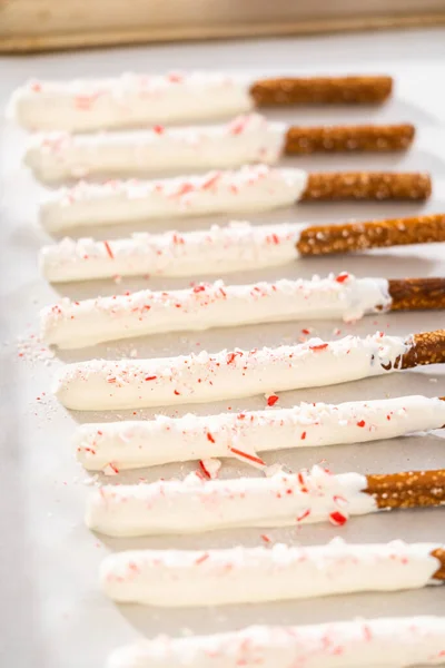 Homemade Candy Cane Chocolate Covered Pretzel Rods Drying Baking Sheet — Stock Photo, Image