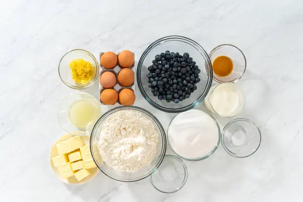 Flat Lay Measured Ingredients Glass Mixing Bowls Bake Lemon Blueberry — Stock Photo, Image
