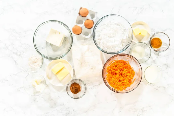 Measured Ingredients Placed Mixing Bowls Counter Preparing Bake Scrumptious Carrot — Stock Photo, Image