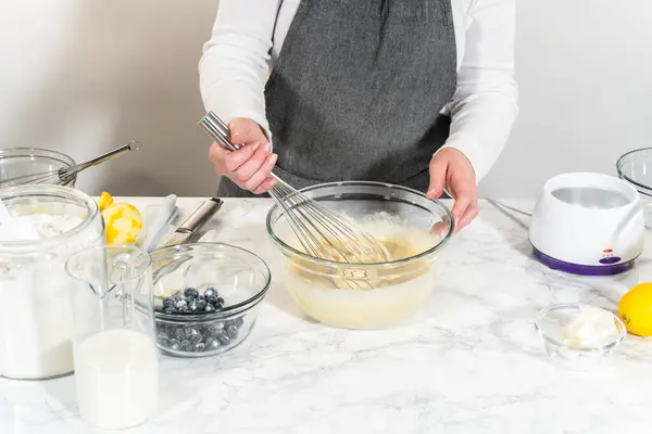 Integrating Ingredients Glass Bowl Adeptly Stirring Whisk Craft Tantalizing Lemon — Stock Photo, Image