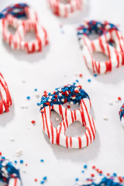 Dipping Pretzels Twists Melted Chocolate Make Red White Blue Chocolate — Stock Photo, Image