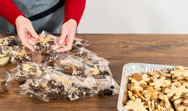Carefully Packaging Christmas Cutout Cookies Half Dipped Chocolate Presented Clear — Stock Photo, Image