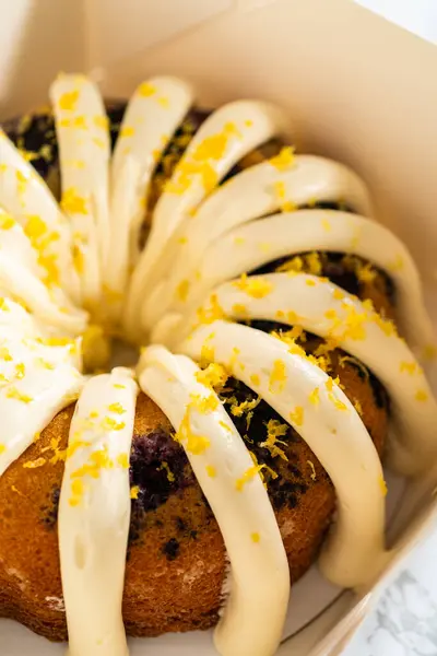 Freshly Baked Bundt Cakes Carefully Nestled White Paper Boxes Preparing — Stock Photo, Image