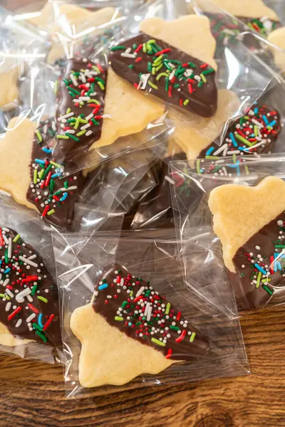 Carefully Packaging Christmas Cutout Cookies Half Dipped Chocolate Presented Clear — Stock Photo, Image