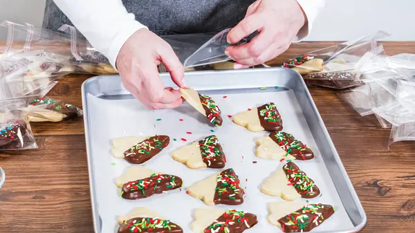 Carefully Packaging Christmas Cutout Cookies Half Dipped Chocolate Presented Clear Stock Image