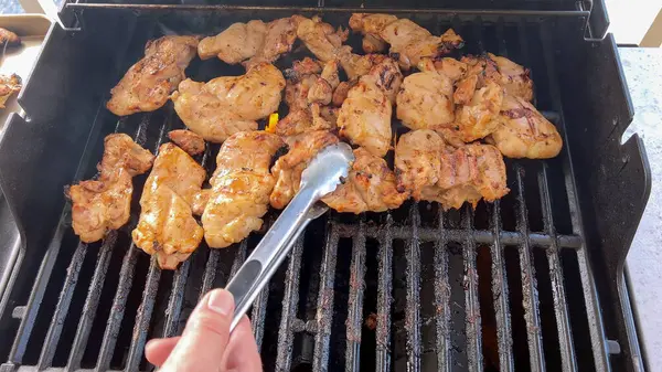 Close Image Capturing Process Grilling Marinated Chicken Pieces Person Expertly Stock Image