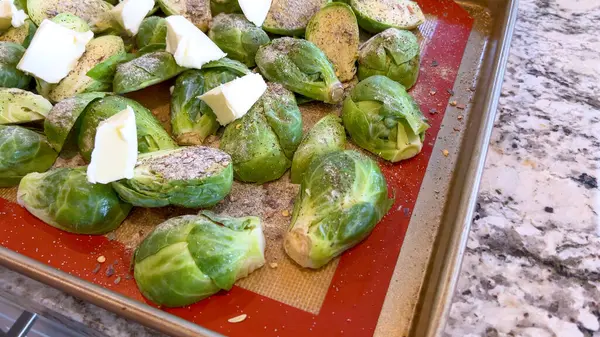 Fresh Brussels Sprouts Seasoned Spices Topped Slices Butter Arranged Baking Stock Picture