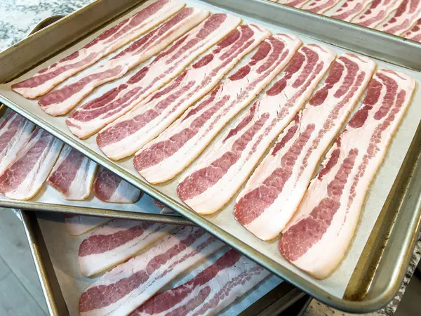 Neatly Arranged Raw Bacon Strips Baking Tray Prepared Cooking Capturing Stock Photo