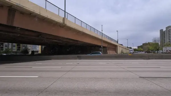 stock image A dynamic view of the elevated highway overpass in South Denver, showcasing the intricate concrete structures and modern road design. The image captures the expansive lanes and surrounding landscape