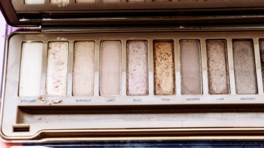 Denver, Colorado, USA-December 31, 2023-Beauty products are displayed with sophistication, featuring shimmering blush palettes, elegant lipsticks, and sleek foundations, reflecting luxury in the store clipart