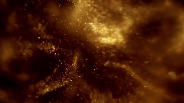 金の塵粒子はゆっくりと空気中のゆっくりとした動きで飛ぶ ダスト粒子背景ボケライト黒の背景に背景4K映像雪粒子背景 — ストック動画