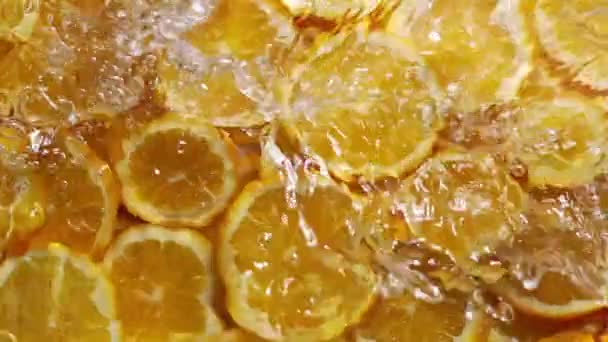 Slow Motion Drop Water Orange Background — Stok Video