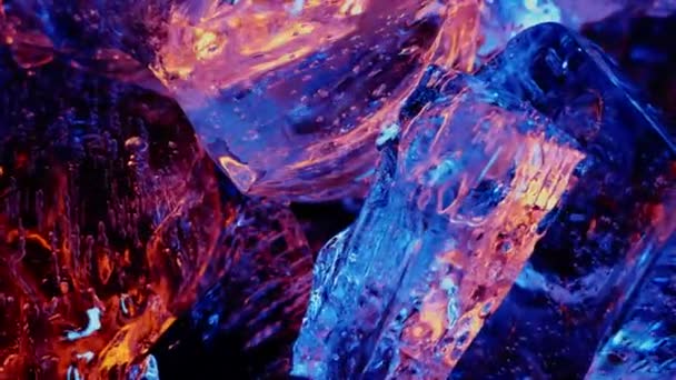 Eiswürfel Auf Farbe Feuerlicht Abstrakte Tapete — Stockvideo