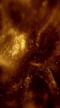 Altın dokular ve yaratıcılığa ilham veren ışıldayan parçacıklardan oluşan büyüleyici bir yakın çekim fotoğrafı.