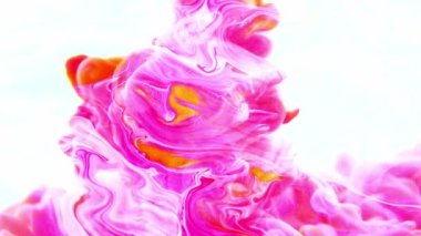 Pink ink dropped in water on white background . High quality 4k footage