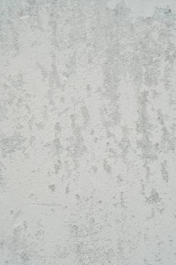 Detailed view of a white wall showing signs of dirt and grime accumulated on the surface, giving it a weathered appearance. clipart