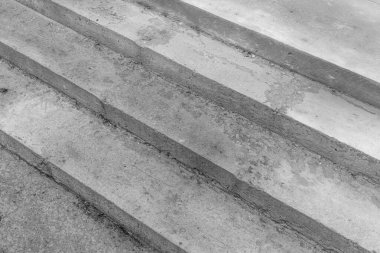 Somut adımlar tek renk tonlarında ince desenler ve dokular gösterir.