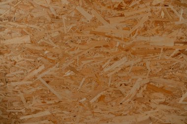 Yumuşak, açık kahverengi desenli oryantasyon iplikçiklerinin yakın görüntüsü.