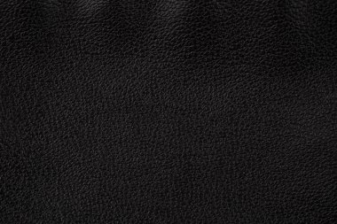 Siyah deri desenli sırt çantası. Deri bir zemin gibi