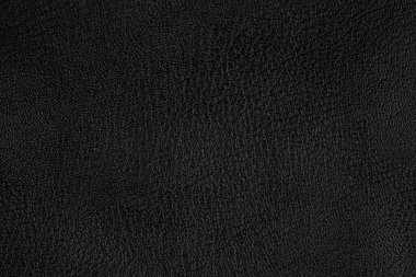 Siyah deri desenli sırt çantası. Deri bir zemin gibi