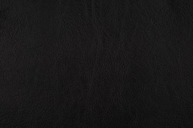 Siyah deri desenli sırt çantası. Deri bir zemin gibi