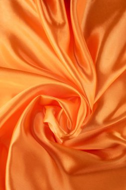 Pürüzsüz ve Parlak Bitirimli Lüks Turuncu Saten Kumaş. İpeksi arkaplan. 
