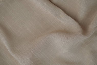 Katlanmış bej kumaş. Pamuk kumaş arka plan..