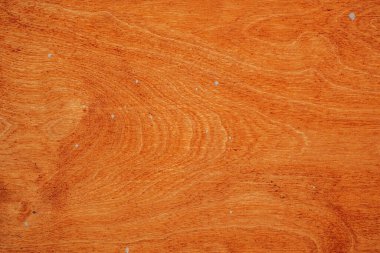 Sıcak ahşap yüzey karmaşık desenler ve ince kusurlar gösterir..