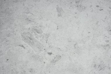 Pürüzsüz gri yüzey, modern dekor estetiğini geliştirerek karmaşık desenler sergiliyor..