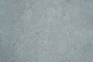 İnce detaylar ve yüzey tahıllarıyla mavi tonlu beton duvar dokusu