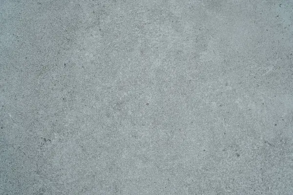 İnce detaylar ve yüzey tahıllarıyla mavi tonlu beton duvar dokusu