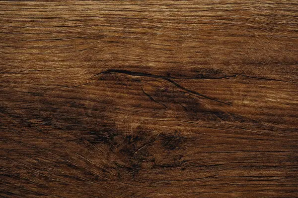 Koyu kahverengi ahşap dokular, akan tahıllar ve derin doğal çizgiler.