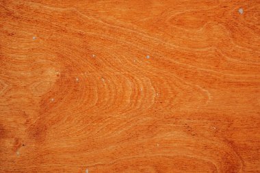 Sıcak ahşap yüzey karmaşık desenler ve ince kusurlar gösterir..
