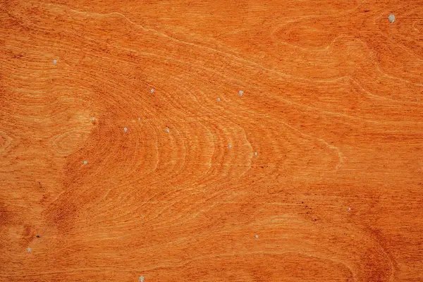 Sıcak ahşap yüzey karmaşık desenler ve ince kusurlar gösterir..