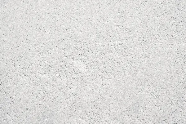 Aydınlatma koşulları altında yumuşak dokuya sahip parlak beyaz yüzey.