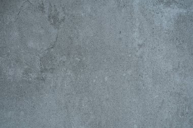 İnce detaylar ve yüzey tahıllarıyla mavi tonlu beton duvar dokusu