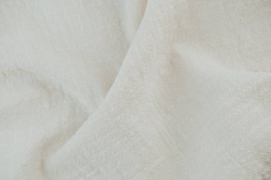 Moda tasarımı ya da markalaşma için krem beyazına sarılmış pamuk kumaş.