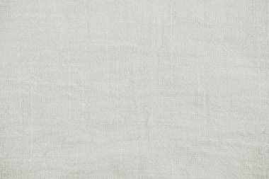 Asgari yaşam tarzı veya sürdürülebilir moda temaları için beyaz pamuk kumaş dokusu