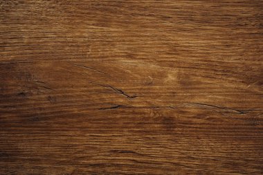 Kahverengi ahşap yüzey dokusu ve sıcak ton arkaplanı