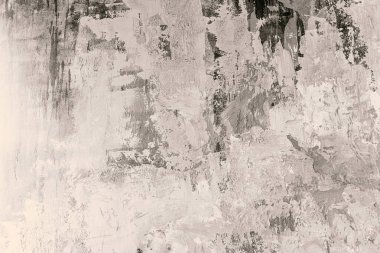 Kalıplı yüzey, çeşitli şekillerde gri ve beyaz boya katmanları içerir..