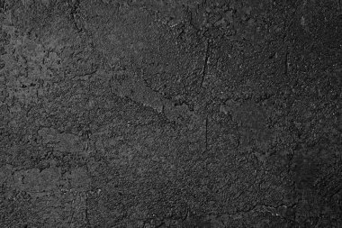 Çarpıcı benekli deseni ve kontrastı olan siyah ve beyaz desenli duvar