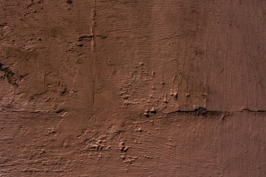 Kırsal mimari ve klasik arka plan konsepti için kaba desenli kahverengi bir duvar.